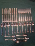 1881 Rogers Stainless Oneida Arbor Rose 32 Pieces. Fixed Price $30.00.
