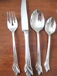 4 Pieces Oneida Leander Stainless Knife Spoons Fork. Fixed Price $17.00.
