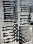 Oneida Melinda Stainless Flatware Japan. 36 Pcs Spoons, Fork, Knives. Incomplete. Fixed Price $49.95.