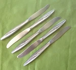 Dinner Knives International Stainless 1847 Rogers Bros Sea Island Pattern 8.5". Fixed Price $12.99.