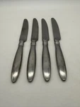 Set Of 4 Farberware Katie Stainless Steel Dinner Knives. Fixed Price $25.00.