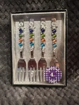 Wild Eye Designs 4 Piece Appetizer Mini Forks Multicolored - New Box. Fixed Price $44.99.