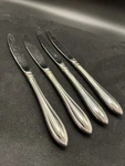 Lot (4) Oneida Sheraton Stainless Glossy Dinner Knife With Cube. Fixed Price $39.00.