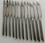 12 Pcs Towle Wave Living Collection Serrated Edge 4.5" Blade Steak Knives. Fixed Price $67.83.