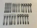 Knork 24 Piece Matte Silver Flatware Ergonomic Design 4+ Place Settings. Fixed Price $115.00.