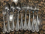 Of 9 Gourmet Settings GON23 Stainless Flatware Outlined Forks Spoons. Fixed Price $21.25.