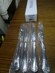 4 Oneida True Rose Dinner Knives. Fixed Price $25.49.