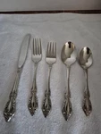 Oneida Michelangelo 2 Flatware Set. Fixed Price $60.00.
