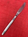 Riviera Dinner Knife Modern Flower Solid RIF12 Stainless Steel. Fixed Price $12.50.
