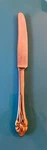 Golden Amaryllis (stainless With Accent) Dinner Knife, Oneida Silver. Fixed Price $12.00.