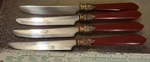 Hampton Silversmiths Stella Red Stainless Butter Knifes HSV122 Set Of 4. Fixed Price $15.00.