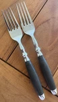 Fork HSV82 Stainless By Hampton Silversmiths 7 3/4" Black Handle. Fixed Price $12.79.