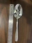 Cambridge Slotted Stainless Steel Serving Spoon 10 1/2 Long 3/8 Wide. Fixed Price $15.81.