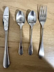 Oneida Lumos Dinner Knives Spoon Fork New. Fixed Price $50.00.