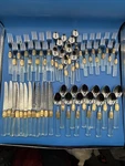 Mikasa Laslo Prisma Clear Acrylic Gold Accent Silverware 60 Pc Set. Fixed Price $260.00.