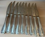 Gibson Gia 19 Set Of 8 Serrated Steak Knives Stainless. Fixed Price $79.95.