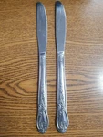 2X Kimco Stainless Korea Glossy Scrolls Silverware Flatware Dinner Knives. Fixed Price $6.80.