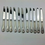 11 Dinner Knives The Main Course MNF27 Shell Stainless Serrated Flatware. Fixed Price $39.99.