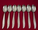 Lot Of 7 Montgomery Ward MWD21 Stainless Japan Flower Glossy Teaspoons 6". Fixed Price $30.33.