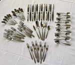 Oneida Risotto 18/10 Stainless Steel Flatware Set Glossy Frost 62 Pc. Fixed Price $200.00.