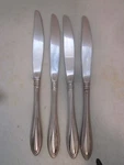 Set Of 4 Oneida Sheraton Stainless Glossy Dinner Knives. Fixed Price $20.00.