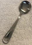 Winco 0005-04, Dots Heavyweight Bouillon Spoon, 18/0 Stainless Steel Dozen. Fixed Price $28.00.