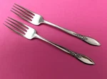2 Oneida Community Spring Rose Stainless Dinner Forks. Fixed Price $29.99.