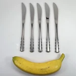 Set Of Five (5) Ekco Eterna Stainless Dinner Knives EKS54 Floral Edge Pattern. Fixed Price $29.99.