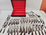 Ekco Eterna EKS28 Flatware Serving For - Set Of 63 Pieces Faux Wood Handle. Fixed Price $284.95.