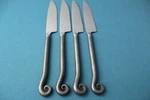 Pier One PII11 Dinner Knives (set Of 4) Scroll Coiled Iron 18/8 China 9". Fixed Price $71.99.