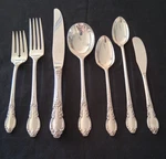 71 Piece Set Londontown Enchantment 1881 Rogers Oneida Knives Forks Spoons. Fixed Price $95.00.
