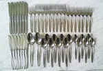 Montgomery Ward MWD8 Stainless Floral Pattern 47 Piece Flatware Set. Fixed Price $118.00.