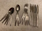 17 Piece Set Vintage Amere AEF3 Stainless Flatware Geometric Dafodil Floral Mcm. Fixed Price $40.00.