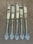 Reed & Barton Select Stainless Elegante Pattern 5 Dinner Knives Korea 9 1/8". Fixed Price $6.99.