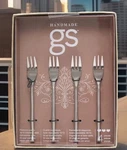 Gourmet Settings Exotique Cocktail Forks 18/10 Stainless Open Box. Fixed Price $45.00.