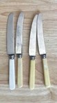 4 Vintage Roberts & Dore Stainless Steel Sheffield England Bone Handle Knives. Fixed Price $8.00.