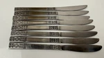 Customcraft CUS3 Fleur De Lis Solid Dinner Knives Stainless Taiwan 1/8". Fixed Price $21.87.