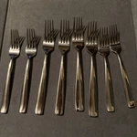 Oneida Stainless Flatware - Moda (glossy) 4 Dinner Forks And Salad. Fixed Price $23.00.
