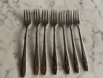 7 Stainless Flatware Silver Silco Mardi Gras Mcm Mid Century Cocktail Forks. Fixed Price $10.80.