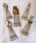 Gourmet Settings Twist & Shout 20PC. Stainless Steel Flatware. Fixed Price $100.00.