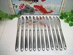 12 International Silver Superior Dynamic Stainless Steel Dinner Knives. Fixed Price $26.98.