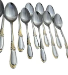 Mikasa Gold-accent 24K On 18/10 Stainless Steel 35 Piece Flatware Set. Fixed Price $111.00.