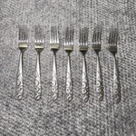 Set Of 7 Oneida Silver Satin Frosted Bohemian Dinner Forks. Fixed Price $24.00.