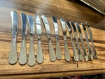 Set Of 12 Dansk Torun 18/10 Stainless Butter Spreader Knives - 7 3/8" Flatware. Fixed Price $100.00.