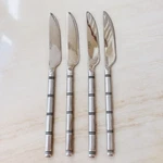 4PC Pier Steak Knife 9 18/8 Stainless Serrated Satin Ribbed/bamboo Handle. Fixed Price $25.00.