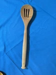 Sabatier Slotted Wood Strainer Spoon 13". Fixed Price $5.00.