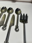 Gourmet Settings Stainless Steel Modern Flatware 10 Spoon Knife Fork Glossy. Fixed Price $35.00.