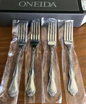 New Boxed Of 4 Oneida Arbor Rose True Stainless Steel Dinner Forks. Fixed Price $34.90.