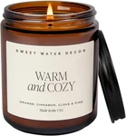 Sweet Water Decor Warm Cozy Soy Candle - Orange Peel, Tan Label, Amber. Fixed Price $32.19.