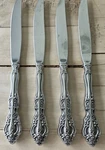 Vintage Oneida Stainless Michelangelo Dinner Knives - Set Of Four. Fixed Price $24.49.